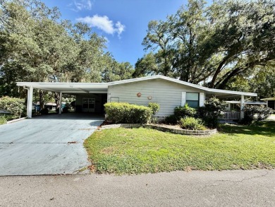 Home is located in Water Oak Country Club Estates in Lady Lake on Water Oak Country Club Estates in Florida - for sale on GolfHomes.com, golf home, golf lot