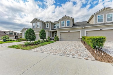 Absolutely stunning and very well-maintained townhouse at on Esplanade Golf and Country at Lakewood Ranch in Florida - for sale on GolfHomes.com, golf home, golf lot