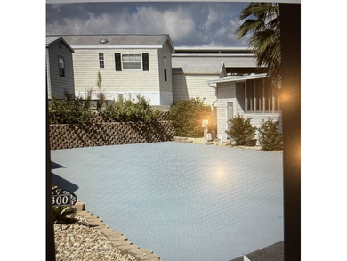 RV lot with full hookups, brick retaining wall and ready for new on Deer Creek RV Golf Resort in Florida - for sale on GolfHomes.com, golf home, golf lot