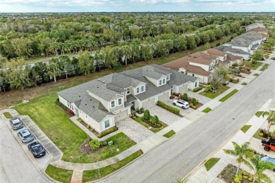 Absolutely stunning and very well-maintained townhouse at on Esplanade Golf and Country at Lakewood Ranch in Florida - for sale on GolfHomes.com, golf home, golf lot