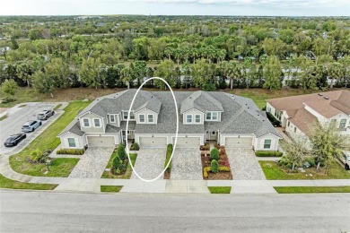 Absolutely stunning and very well-maintained townhouse at on Esplanade Golf and Country at Lakewood Ranch in Florida - for sale on GolfHomes.com, golf home, golf lot
