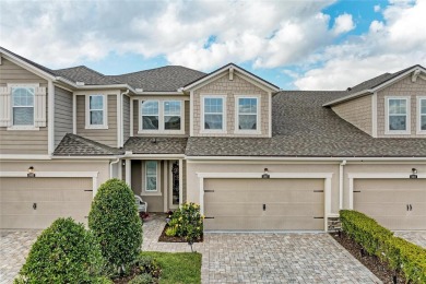 Absolutely stunning and very well-maintained townhouse at on Esplanade Golf and Country at Lakewood Ranch in Florida - for sale on GolfHomes.com, golf home, golf lot