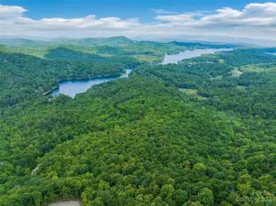 Perfectly located overlooking NCs largest private lake, Toxaway on Lake Toxaway Country Club in North Carolina - for sale on GolfHomes.com, golf home, golf lot