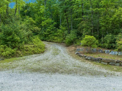 Perfectly located overlooking NCs largest private lake, Toxaway on Lake Toxaway Country Club in North Carolina - for sale on GolfHomes.com, golf home, golf lot