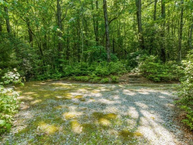 Perfectly located overlooking NCs largest private lake, Toxaway on Lake Toxaway Country Club in North Carolina - for sale on GolfHomes.com, golf home, golf lot