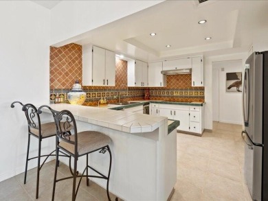Spacious corner unit with tile flooring throughout, featuring on Desert Island Golf and Country Club in California - for sale on GolfHomes.com, golf home, golf lot