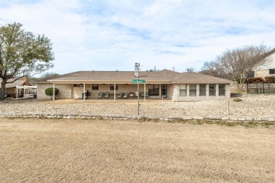 Experience resort-style living in the highly sought-after, gated on De Cordova Bend Country Club in Texas - for sale on GolfHomes.com, golf home, golf lot