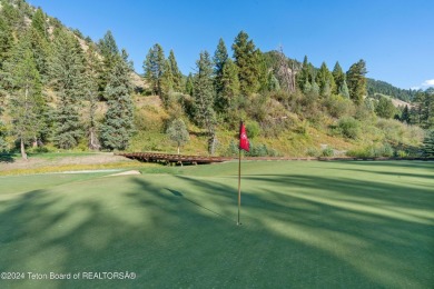 Lot 83 in the exclusive Snake River Sporting Club is situated on Snake River Sporting Club in Wyoming - for sale on GolfHomes.com, golf home, golf lot