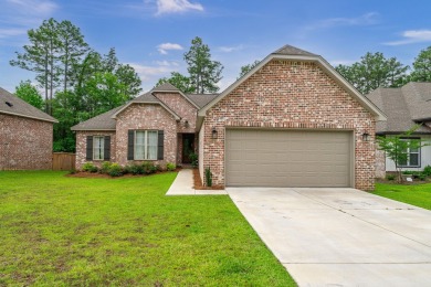 Located on the golf course is this awesome like-new brick home on Shadow Ridge Golf Club in Mississippi - for sale on GolfHomes.com, golf home, golf lot