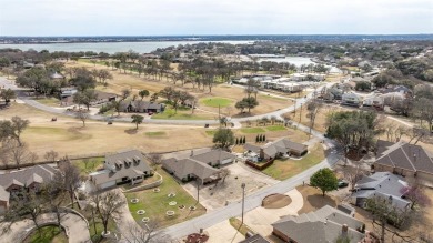 Experience resort-style living in the highly sought-after, gated on De Cordova Bend Country Club in Texas - for sale on GolfHomes.com, golf home, golf lot