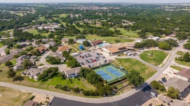 Experience resort-style living in the highly sought-after, gated on De Cordova Bend Country Club in Texas - for sale on GolfHomes.com, golf home, golf lot