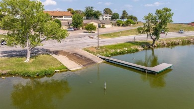 Experience resort-style living in the highly sought-after, gated on De Cordova Bend Country Club in Texas - for sale on GolfHomes.com, golf home, golf lot