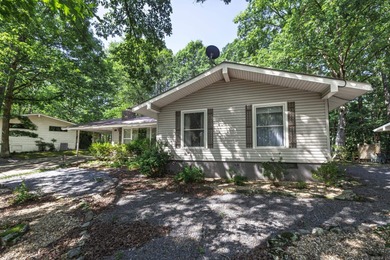 Don't miss this one!  Large living room with picture window and on Cortez Golf Course in Arkansas - for sale on GolfHomes.com, golf home, golf lot