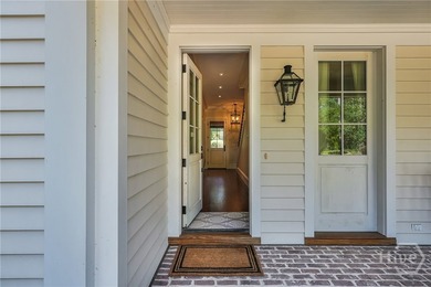 Tucked within this exclusive community, this 4-bed, 4-full & on The Ford Field and River Club  in Georgia - for sale on GolfHomes.com, golf home, golf lot