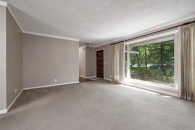 Don't miss this one!  Large living room with picture window and on Cortez Golf Course in Arkansas - for sale on GolfHomes.com, golf home, golf lot