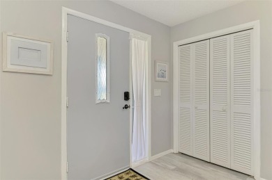 MUST SEE!  SPLIT BEDROOM PLAN!  DOUBLE LOT!  UPDATED!  HEATED on Oyster Creek Golf Club in Florida - for sale on GolfHomes.com, golf home, golf lot