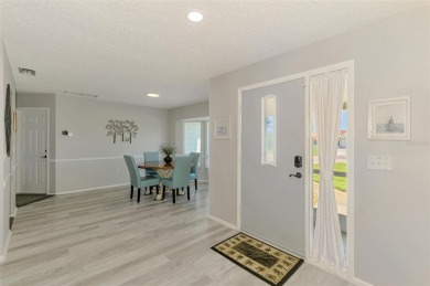 MUST SEE!  SPLIT BEDROOM PLAN!  DOUBLE LOT!  UPDATED!  HEATED on Oyster Creek Golf Club in Florida - for sale on GolfHomes.com, golf home, golf lot