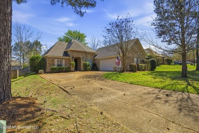 Welcome to this beautiful home located in the highly desirable on Lake Caroline Golf Club in Mississippi - for sale on GolfHomes.com, golf home, golf lot