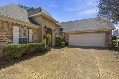 Welcome to this beautiful home located in the highly desirable on Lake Caroline Golf Club in Mississippi - for sale on GolfHomes.com, golf home, golf lot