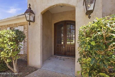 Welcome to this beautiful home located in the highly desirable on Lake Caroline Golf Club in Mississippi - for sale on GolfHomes.com, golf home, golf lot