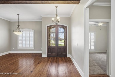 Welcome to this beautiful home located in the highly desirable on Lake Caroline Golf Club in Mississippi - for sale on GolfHomes.com, golf home, golf lot