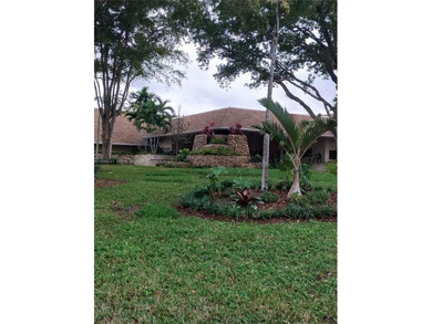 Waterfront/golf course view from your Sunrise Lakes Phase 4 on Sunrise Lakes Phase IV Golf Course in Florida - for sale on GolfHomes.com, golf home, golf lot