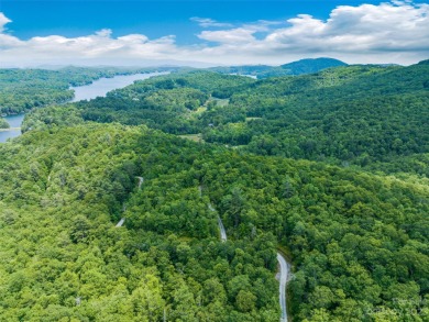 Perfectly located overlooking NCs largest private lake, this on Lake Toxaway Country Club in North Carolina - for sale on GolfHomes.com, golf home, golf lot