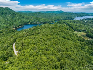 Perfectly located overlooking NCs largest private lake, this on Lake Toxaway Country Club in North Carolina - for sale on GolfHomes.com, golf home, golf lot