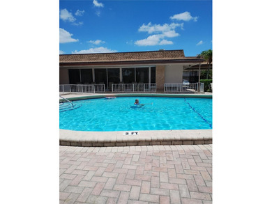 Waterfront/golf course view from your Sunrise Lakes Phase 4 on Sunrise Lakes Phase IV Golf Course in Florida - for sale on GolfHomes.com, golf home, golf lot