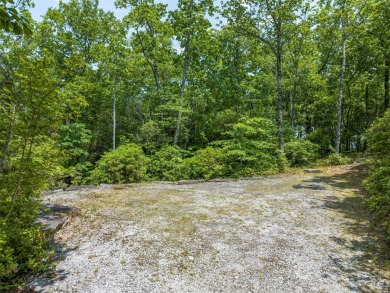 Perfectly located overlooking NCs largest private lake, this on Lake Toxaway Country Club in North Carolina - for sale on GolfHomes.com, golf home, golf lot