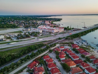 Breathtaking views of Lake Ray Hubbard sunsets await you from on Lakeside Village Golf Course in Texas - for sale on GolfHomes.com, golf home, golf lot