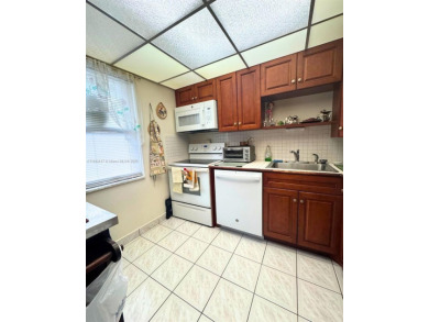 Beautifully maintained 1-bedroom, 1-bathroom condo nestled in a on Oriole Golf and Tennis Club in Florida - for sale on GolfHomes.com, golf home, golf lot