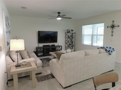 JUST LIKE NEW.. BUT BETTER! This barely lived in Aria model home on Lake Diamond Golf and Country Club in Florida - for sale on GolfHomes.com, golf home, golf lot