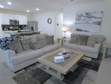 JUST LIKE NEW.. BUT BETTER! This barely lived in Aria model home on Lake Diamond Golf and Country Club in Florida - for sale on GolfHomes.com, golf home, golf lot