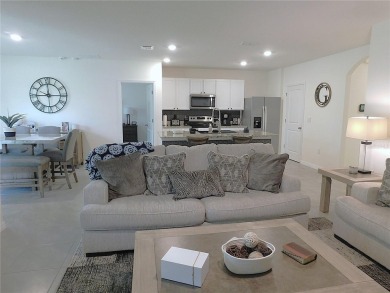 JUST LIKE NEW.. BUT BETTER! This barely lived in Aria model home on Lake Diamond Golf and Country Club in Florida - for sale on GolfHomes.com, golf home, golf lot