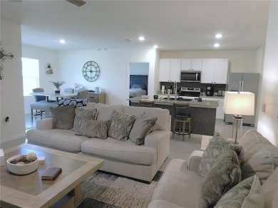 JUST LIKE NEW.. BUT BETTER! This barely lived in Aria model home on Lake Diamond Golf and Country Club in Florida - for sale on GolfHomes.com, golf home, golf lot