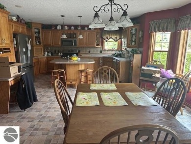 THE LAKE HOUSE. A prime location. Situated right where the on The Pines Golf Course at Lake Isabella in Michigan - for sale on GolfHomes.com, golf home, golf lot