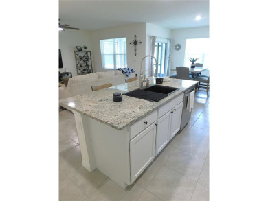 JUST LIKE NEW.. BUT BETTER! This barely lived in Aria model home on Lake Diamond Golf and Country Club in Florida - for sale on GolfHomes.com, golf home, golf lot