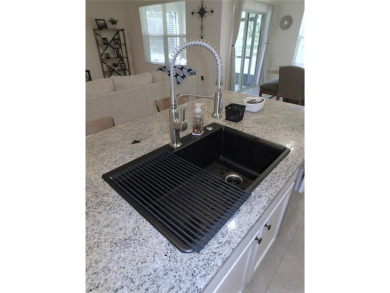 JUST LIKE NEW.. BUT BETTER! This barely lived in Aria model home on Lake Diamond Golf and Country Club in Florida - for sale on GolfHomes.com, golf home, golf lot