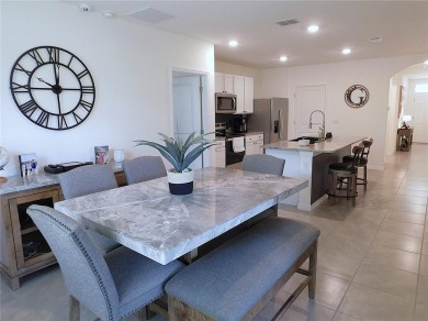 JUST LIKE NEW.. BUT BETTER! This barely lived in Aria model home on Lake Diamond Golf and Country Club in Florida - for sale on GolfHomes.com, golf home, golf lot