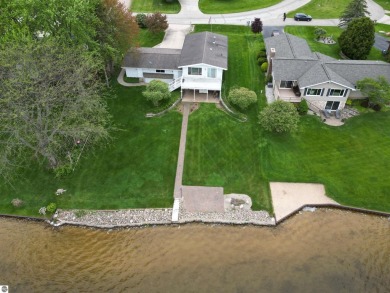 THE LAKE HOUSE. A prime location. Situated right where the on The Pines Golf Course at Lake Isabella in Michigan - for sale on GolfHomes.com, golf home, golf lot