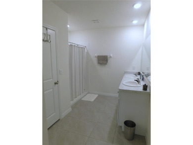 JUST LIKE NEW.. BUT BETTER! This barely lived in Aria model home on Lake Diamond Golf and Country Club in Florida - for sale on GolfHomes.com, golf home, golf lot