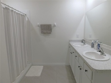 JUST LIKE NEW.. BUT BETTER! This barely lived in Aria model home on Lake Diamond Golf and Country Club in Florida - for sale on GolfHomes.com, golf home, golf lot