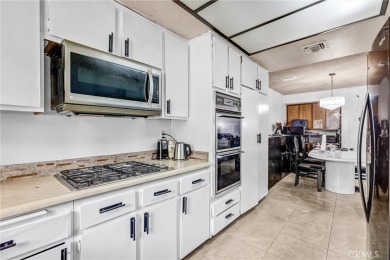 This perfect condo is nestled along the foothills of Azusa! on Azusa Greens Country Club in California - for sale on GolfHomes.com, golf home, golf lot