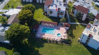 VIEWS of Golf course, pool, and hot tub. Welcome to this on Lakewood Country Club in Florida - for sale on GolfHomes.com, golf home, golf lot