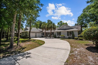 This sprawling home  is located in the prestigious Lake Forest on Brick Landing Plantation Yacht and Golf Club in North Carolina - for sale on GolfHomes.com, golf home, golf lot