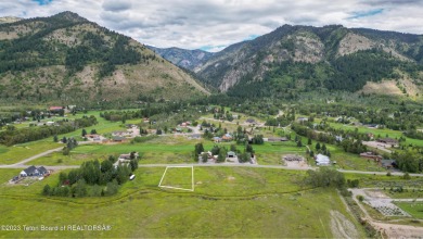 Great, ready-to-build lot offering expansive mountain views and on Star Valley RV Golf Course in Wyoming - for sale on GolfHomes.com, golf home, golf lot