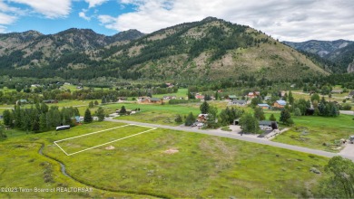 Great, ready-to-build lot offering expansive mountain views and on Star Valley RV Golf Course in Wyoming - for sale on GolfHomes.com, golf home, golf lot