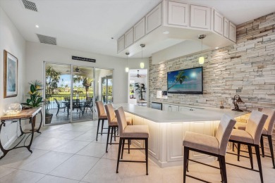 A beautifully remodeled and furnished top floor coach home on The Rookery At Marco in Florida - for sale on GolfHomes.com, golf home, golf lot