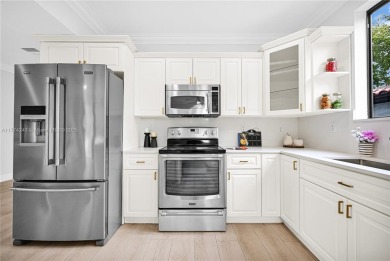 Stunningly renovated 3-bedroom, 3-bathroom home located in the on Normandy Shores Golf Course in Florida - for sale on GolfHomes.com, golf home, golf lot